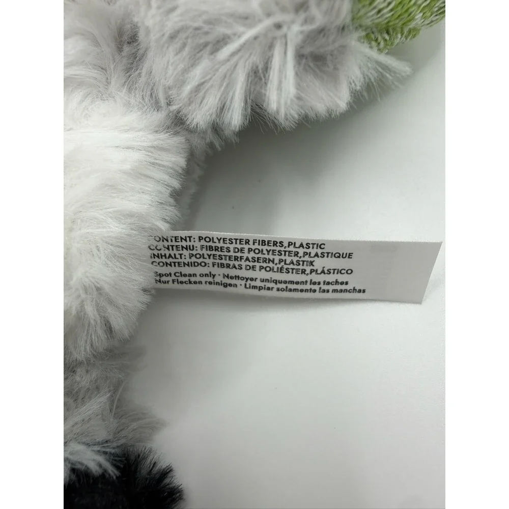 KONG Flopzie Low Stuff Raccoon Dog Toy Squeaky Weighted Medium LWF24